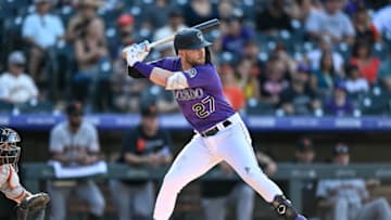 DENVER, CO - SEPTEMBER 26: Trevor Story #27 of the Colorado Rockies bats during a game against the San Francisco Giants at Coors Field on September 26, 2021 in Denver, Colorado. (Photo by Dustin Bradford/Getty Images)