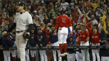 BOSTON, MASSACHUSETTS - OCTOBER 05: Xander Bogaerts #2 of the Boston Red Sox reacts after his two run home run against the New York Yankees during the first inning of the American League Wild Card game at Fenway Park on October 05, 2021 in Boston, Massachusetts. (Photo by Winslow Townson/Getty Images)