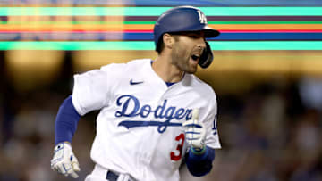 LOS ANGELES, CALIFORNIA - OCTOBER 12: Chris Taylor #3 of the Los Angeles Dodgers reacts to his sacrifice fly to score Gavin Lux #9 of the Los Angeles Dodgers against the San Francisco Giants during the second inning in game 4 of the National League Division Series at Dodger Stadium on October 12, 2021 in Los Angeles, California. (Photo by Harry How/Getty Images)
