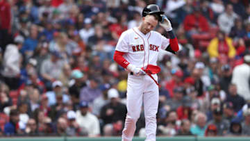 BOSTON, MASSACHUSETTS - APRIL 21: Trevor Story #10 of the Boston Red Sox reacts after striking out during the third inning against the Toronto Blue Jays at Fenway Park on April 21, 2022 in Boston, Massachusetts. (Photo by Maddie Meyer/Getty Images)