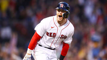 BOSTON, MA - MAY 20: Trevor Story #10 of the Boston Red Sox reacts after hitting a grand slam in the third inning of a game against the Seattle Mariners at Fenway Park on May 20, 2022 in Boston, Massachusetts. (Photo by Adam Glanzman/Getty Images)