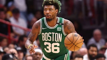 MIAMI, FLORIDA - MAY 19: Marcus Smart #36 of the Boston Celtics in action against the Miami Heat in Game Two of the 2022 NBA Playoffs Eastern Conference Finals at FTX Arena on May 19, 2022 in Miami, Florida. NOTE TO USER: User expressly acknowledges and agrees that, by downloading and or using this photograph, User is consenting to the terms and conditions of the Getty Images License Agreement. (Photo by Michael Reaves/Getty Images)