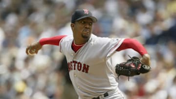 BRONX, NY - JULY 7: Starting pitcher Pedro Martinez #45 the Boston Red Sox pitches against the New York Yankees during the MLB game at Yankee Stadium on July 7, 2003 in Bronx, New York. The Yankees defeated the Red Sox 2-1. (Photo by Ezra Shaw/Getty Images)