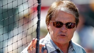 MESA, AZ - MARCH 10: Chief baseball officer Tony La Russa of the Arizona Diamondbacks gestures as he talks with coaches in the dugout before the spring training game against the Oakland Athletics at HoHoKam Stadium on March 10, 2015 in Mesa, Arizona. (Photo by Christian Petersen/Getty Images)