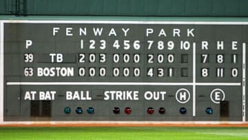 BOSTON - OCTOBER 16: The final scoreboard is seen after the Boston Red Sox defeated the Tampa Bay Rays after game five of the American League Championship Series during the 2008 MLB playoffs at Fenway Park on October 16, 2008 in Boston, Massachusetts. The Red Sox defeated the Rays 8-7 to set the series at 3-2 Rays. (Photo by Jim McIsaac/Getty Images)
