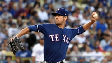 LOS ANGELES, CA - JUNE 13: Cole Hamels #35 of the Texas Rangers pitches in the second inning of the game against the Los Angeles Dodgers at Dodger Stadium on June 13, 2018 in Los Angeles, California. (Photo by Jayne Kamin-Oncea/Getty Images)