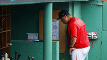 BOSTON, MA - OCTOBER 09: Manager John Farrell of the Boston Red Sox walks through the dugout after being ejected from game four of the American League Division Series against the Houston Astros at Fenway Park on October 9, 2017 in Boston, Massachusetts. (Photo by Maddie Meyer/Getty Images)