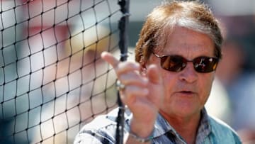 MESA, AZ - MARCH 10: Chief baseball officer Tony La Russa of the Arizona Diamondbacks gestures as he talks with coaches in the dugout before the spring training game against the Oakland Athletics at HoHoKam Stadium on March 10, 2015 in Mesa, Arizona. (Photo by Christian Petersen/Getty Images)