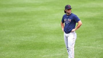 BOSTON, MASSACHUSETTS - JULY 09: Andrew Benintendi #16 of the Boston Red Sox looks on during Summer Workouts at Fenway Park on July 09, 2020 in Boston, Massachusetts. (Photo by Maddie Meyer/Getty Images)