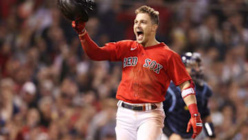 BOSTON, MASSACHUSETTS - OCTOBER 11: Enrique Hernandez #5 of the Boston Red Sox celebrates his game winning sacrifice fly in the ninth inning against the Tampa Bay Rays during Game 4 of the American League Division Series at Fenway Park on October 11, 2021 in Boston, Massachusetts. (Photo by Maddie Meyer/Getty Images)