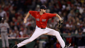 BOSTON, MASSACHUSETTS - OCTOBER 19: Garrett Whitlock #72 of the Boston Red Sox pitches against the Houston Astros in the seventh inning of Game Four of the American League Championship Series at Fenway Park on October 19, 2021 in Boston, Massachusetts. (Photo by Elsa/Getty Images)