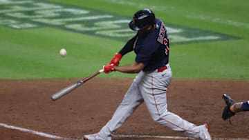 HOUSTON, TEXAS - OCTOBER 22: Rafael Devers #11 of the Boston Red Sox pops out against the Boston Red Sox during the fourth inning in Game Six of the American League Championship Series at Minute Maid Park on October 22, 2021 in Houston, Texas. (Photo by Bob Levey/Getty Images)
