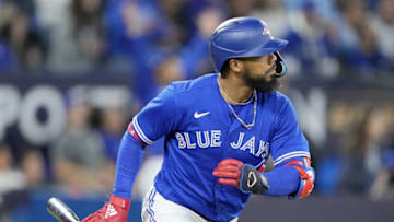 TORONTO, ONTARIO - OCTOBER 08: Teoscar Hernandez #37 of the Toronto Blue Jays celebrates after hitting a home run to center field against Robbie Ray #38 of the Seattle Mariners during the fourth inning in game two of the American League Wild Card Series at Rogers Centre on October 08, 2022 in Toronto, Ontario. (Photo by Mark Blinch/Getty Images)