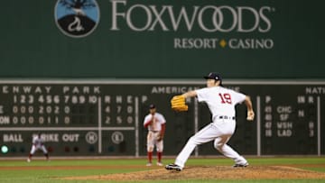 BOSTON, MA - OCTOBER 10: Koji Uehara #19 of the Boston Red Sox pitches in the eighth inning against the Cleveland Indians during game three of the American League Divison Series at Fenway Park on October 10, 2016 in Boston, Massachusetts. (Photo by Maddie Meyer/Getty Images)