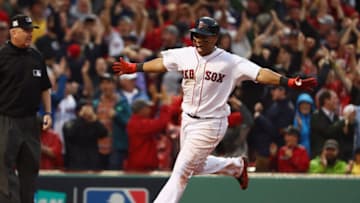 BOSTON, MA - OCTOBER 09: Rafael Devers #11 of the Boston Red Sox celebrates after hitting an inside the park home run in the ninth inning against the Houston Astros during game four of the American League Division Series at Fenway Park on October 9, 2017 in Boston, Massachusetts. (Photo by Maddie Meyer/Getty Images)