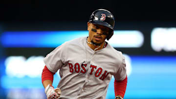 TORONTO, ON - SEPTEMBER 10: Mookie Betts #50 of the Boston Red Sox rounds third base after hitting a home run in the first inning during a MLB game against the Toronto Blue Jays at Rogers Centre on September 10, 2019 in Toronto, Canada. (Photo by Vaughn Ridley/Getty Images)