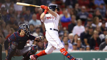 BOSTON, MASSACHUSETTS - SEPTEMBER 03: Andrew Benintendi #16 of the Boston Red Sox hits a home run during the eighth inning against the Minnesota Twins at Fenway Park on September 03, 2019 in Boston, Massachusetts. (Photo by Maddie Meyer/Getty Images)