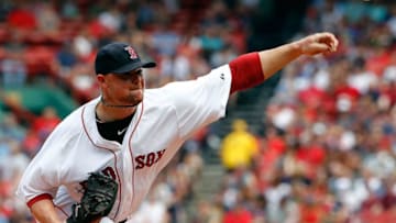 BOSTON, MA - JULY 20: Jon Lester #31 of the Boston Red Sox throws in the first inning against the Kansas City Royals at Fenway Park on July 20, 2014 in Boston, Massachusetts. (Photo by Jim Rogash/Getty Images)