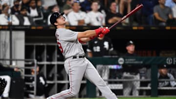 CHICAGO, IL - SEPTEMBER 10: Bobby Dalbec #29 of the Boston Red Sox hits a triple in the seventh inning against the Chicago White Sox at Guaranteed Rate Field on September 10, 2021 in Chicago, Illinois. (Photo by Jamie Sabau/Getty Images)