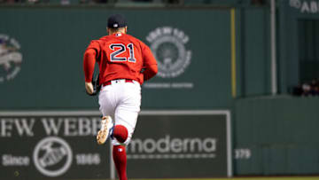 BOSTON, MA - SEPTEMBER 16: Enrique Hernandez of the Boston Red Sox displays the number 21 in recognition of Roberto Clemente during the ninth inning of a game against the Kansas City Royals on September 16, 2022 at Fenway Park in Boston, Massachusetts.(Photo by Billie Weiss/Boston Red Sox/Getty Images)