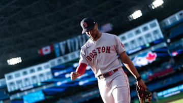 TORONTO, ON - JUNE 28: Xander Bogaerts #2 of the Boston Red Sox walks to the dugout before playing the Toronto Blue Jays in the in their MLB game at the Rogers Centre on June 28, 2022 in Toronto, Ontario, Canada. (Photo by Mark Blinch/Getty Images)