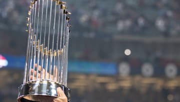 LOS ANGELES, CA - OCTOBER 28: Boston Red Sox President of Baseball Operations Dave Dombrowski holds up the World Series trophy after winning the 2018 World Series in game five against the Los Angeles Dodgers on October 28, 2018 at Dodger Stadium in Los Angeles, California. (Photo by Billie Weiss/Boston Red Sox/Getty Images)
