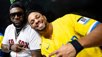 BOSTON, MA - JUNE 20: Former Boston Red Sox designated hitter David Ortiz poses for a photograph with Xander Bogaerts #2 of the Boston Red Sox before a pre-game ceremony to present former left fielder Manny Ramirez with his Boston Red Sox Hall of Fame plaque before a game against the Detroit Tigers on June 20, 2022 at Fenway Park in Boston, Massachusetts. (Photo by Billie Weiss/Boston Red Sox/Getty Images)