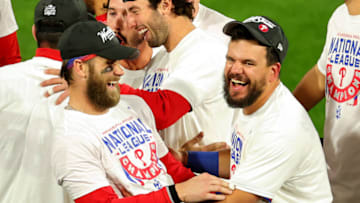 PHILADELPHIA, PENNSYLVANIA - OCTOBER 23: Bryce Harper #3 of the Philadelphia Phillies celebrates with Kyle Schwarber #12 after defeating the San Diego Padres in game five to win the National League Championship Series at Citizens Bank Park on October 23, 2022 in Philadelphia, Pennsylvania. (Photo by Michael Reaves/Getty Images)