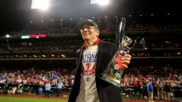PHILADELPHIA, PENNSYLVANIA - OCTOBER 23: Philadelphia Phillies owner John Middleton lifts the Warren C. Giles trophy after the Phillies defeated the San Diego Padres in game five to win the National League Championship Series at Citizens Bank Park on October 23, 2022 in Philadelphia, Pennsylvania. (Photo by Tim Nwachukwu/Getty Images)