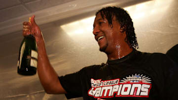 NEW YORK - OCTOBER 20: Pedro Martinez #45 and of the Boston Red Sox celebrate after defeating the New York Yankees 10-3 to win game seven of the American League Championship Series on October 20, 2004 at Yankee Stadium in the Bronx borough of New York City.(Photo by Doug Pensinger/Getty Images)