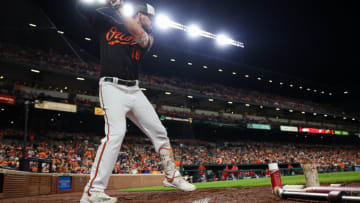 BALTIMORE, MD - JULY 08: Trey Mancini #16 of the Baltimore Orioles warms up against the Los Angeles Angels during the eighth inning at Oriole Park at Camden Yards on July 8, 2022 in Baltimore, Maryland. (Photo by Scott Taetsch/Getty Images)