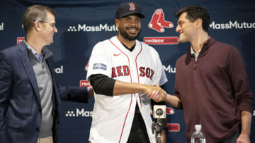 BOSTON, MA - DECEMBER 13: Kenley Jansen #74 of the Boston Red Sox is introduced by Boston Red Sox President & CEO Sam Kennedy and Chief Baseball officer Chaim Bloom during a press conference announcing his contract agreement with the Boston Red Sox on December 13, 2022 at Fenway Park in Boston, Massachusetts. (Photo by Billie Weiss/Boston Red Sox/Getty Images)