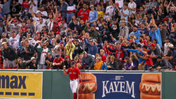 Jul 29, 2021; Boston, Massachusetts, USA; Fans react after Boston Red Sox right fielder Hunter Renfroe (10) robbed a home run during the fifth inning against the Toronto Blue Jays at Fenway Park. Mandatory Credit: Paul Rutherford-USA TODAY Sports