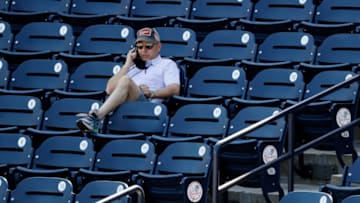 Feb 24, 2021; Tampa, Florida, USA; New York Yankees general manager Brian Cashman looks on during spring training workouts at George M. Steinbrenner Field. Mandatory Credit: Kim Klement-USA TODAY Sports