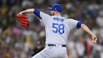 Oct 15, 2022; San Diego, California, USA; Los Angeles Dodgers relief pitcher Chris Martin (58) throws a pitch in the sixth inning against the San Diego Padres during game four of the NLDS for the 2022 MLB Playoffs at Petco Park. Mandatory Credit: Orlando Ramirez-USA TODAY Sports