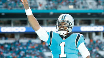 (Photo by Cliff Hawkins/Getty Images) Cam Newton