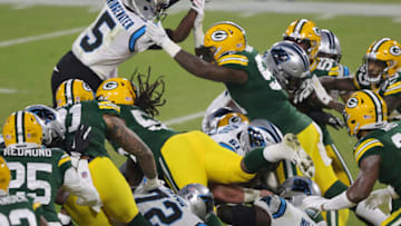 GREEN BAY, WISCONSIN - DECEMBER 19: Inside linebacker Krys Barnes #51 of the Green Bay Packers forces quarterback Teddy Bridgewater #5 of the Carolina Panthers to fumble in the the second quarter of the game at Lambeau Field on December 19, 2020 in Green Bay, Wisconsin. (Photo by Stacy Revere/Getty Images)