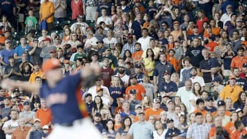 Jun 5, 2016; Houston, TX, USA; Fans applaud as Houston Astros relief pitcher Will Harris (36) pitches against the Oakland Athletics in the ninth inning at Minute Maid Park. Astros won 5-2. Mandatory Credit: Thomas B. Shea-USA TODAY Sports