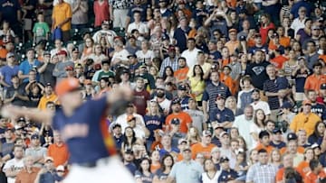 Jun 5, 2016; Houston, TX, USA; Fans applaud as Houston Astros relief pitcher Will Harris (36) pitches against the Oakland Athletics in the ninth inning at Minute Maid Park. Astros won 5-2. Mandatory Credit: Thomas B. Shea-USA TODAY Sports