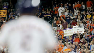 Jul 25, 2016; Houston, TX, USA; Fans hold a Houston Astros third baseman Alex Bregman (2) sign while Bregman bats against the Houston Astros in the ninth inning at Minute Maid Park. Yankees won 2 to 1. Mandatory Credit: Thomas B. Shea-USA TODAY Sports