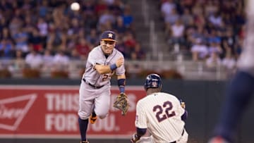 Aug 10, 2016; Minneapolis, MN, USA; Minnesota Twins designated hitter Miguel Sano (22) is out at second as Houston Astros second baseman Jose Altuve (27) tries to turn the double in the first inning at Target Field. Mandatory Credit: Brad Rempel-USA TODAY Sports