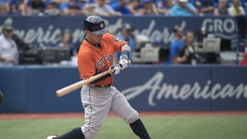 Aug 14, 2016; Toronto, Ontario, CAN; Houston Astros third baseman Alex Bregman (2) hits a single during the third inning in a game against the Toronto Blue Jays at Rogers Centre. Mandatory Credit: Nick Turchiaro-USA TODAY Sports