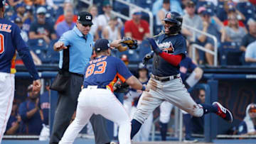 WEST PALM BEACH, FL - FEBRUARY 24: Ronald Acuna Jr. #13 of the Atlanta Braves is tagged out at home plate by Abraham Toro #83 of the Houston Astros in the first inning of a Grapefruit League spring training game at The Ballpark of the Palm Beaches on February 24, 2019 in West Palm Beach, Florida. (Photo by Joe Robbins/Getty Images)