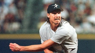 Houston Astros pitcher Randy Johnson pitches against the Atlanta Braves during their game at Turner Field in Atlanta, GA, 02 September. AFP PHOTO Steven Schaefer (Photo by STEVEN SCHAEFER / AFP) (Photo credit should read STEVEN SCHAEFER/AFP via Getty Images)