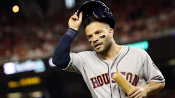 WASHINGTON, DC - OCTOBER 25: Jose Altuve #27 of the Houston Astros celebrates after scoring a run against the Washington Nationals during the third inning in Game Three of the 2019 World Series at Nationals Park on October 25, 2019 in Washington, DC. (Photo by Patrick Smith/Getty Images)