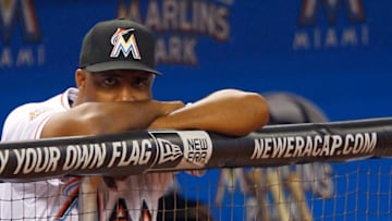 MIAMI, FL - APRIL 29: Batting Coach Eduardo Perez #30 of the Miami Marlins looks on from the dugout during a game against the Arizona Diamondbacks at Marlins Park on April 29, 2012 in Miami, Florida. (Photo by Sarah Glenn/Getty Images)