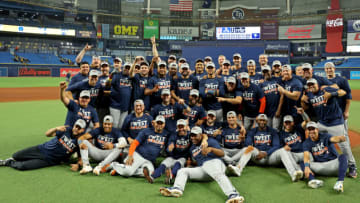 ST PETERSBURG, FLORIDA - SEPTEMBER 19: The Houston Astros celebrates winning the American League West Division following a game against the Tampa Bay Rays at Tropicana Field on September 19, 2022 in St Petersburg, Florida. (Photo by Mike Ehrmann/Getty Images)