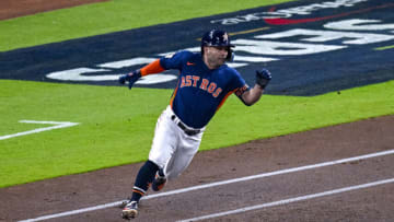 Oct 29, 2022; Houston, Texas, USA; Houston Astros second baseman Jose Altuve (27) rounds first base after he hits a leadoff double against Philadelphia Phillies starting pitcher Zack Wheeler (not pictured) during the first inning during game two of the 2022 World Series at Minute Maid Park. Mandatory Credit: Jerome Miron-USA TODAY Sports
