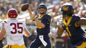Oct 31, 2015; Berkeley, CA, USA; California Golden Bears quarterback Jared Goff (16) prepares to throw a touchdown to California wide receiver Bryce Treggs (1) against the Southern California Trojans in the first quarter at Memorial Stadium. Mandatory Credit: Cary Edmondson-USA TODAY Sports