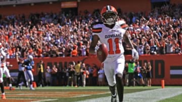 Sep 20, 2015; Cleveland, OH, USA; Cleveland Browns wide receiver Travis Benjamin (11) returns for a punt for a touchdown during the second quarter against the Tennessee Titans at FirstEnergy Stadium. Mandatory Credit: Andrew Weber-USA TODAY Sports